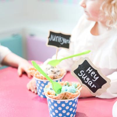 Two kids enjoying ice cream