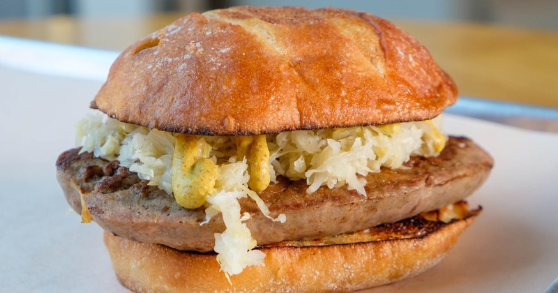 Bratwurst sandwich, with sauerkraut, and mustard