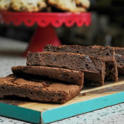 Chocolate brownies served on a wooden board