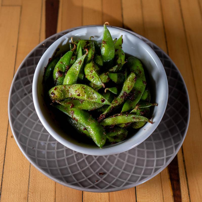 Garlic and soy edamame served