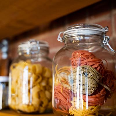 Jars with colorful noodles