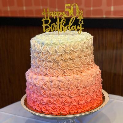 A birthday cake on a stand
