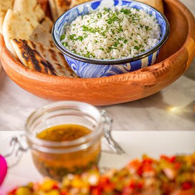 Prawns Kebab with a side of seasoned white rice and pita