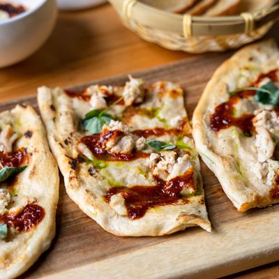 Jalapeno Apple Butter, pepper jack cheese, bacon and fried onions on flatbread