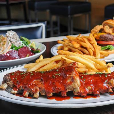 Pork ribs with barbecue sauce and fries