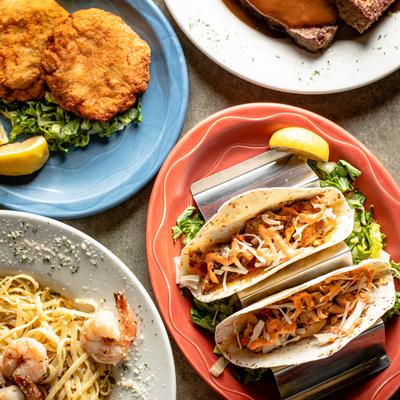 Different dishes displayed on table, top view