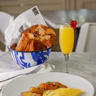 American Omelet with ham and cheddar, and fried sweet potato
