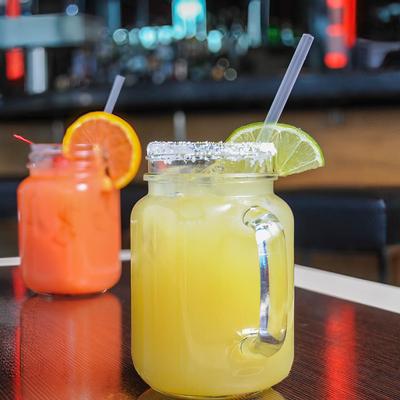 Two glass jars of punch