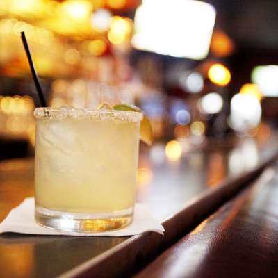 Foggy cocktail with ice on the bar, closeup