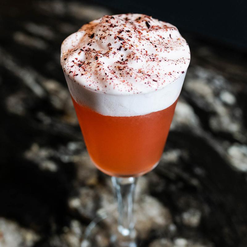 Raspberry beret cocktail with raspberry foam