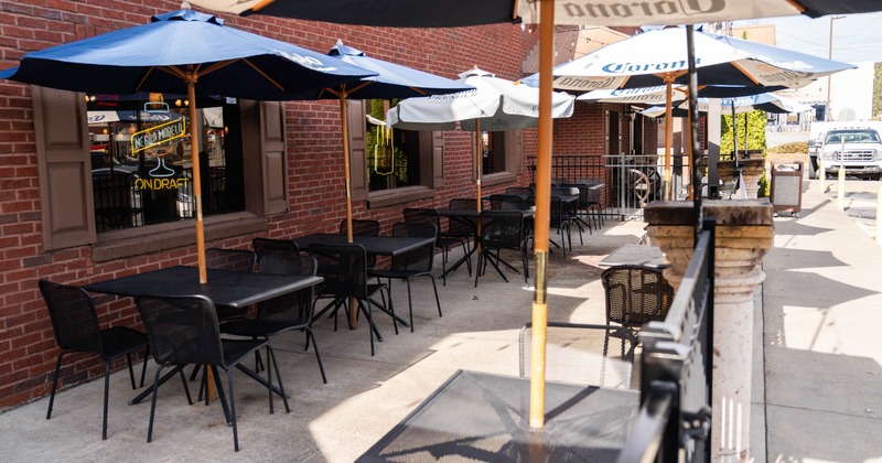 Exterior, patio, dining tables and chairs, parasols