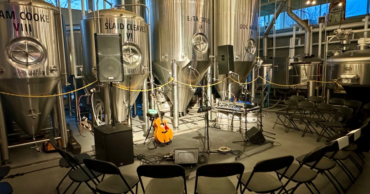 Stage for the band set up by the brewery tanks