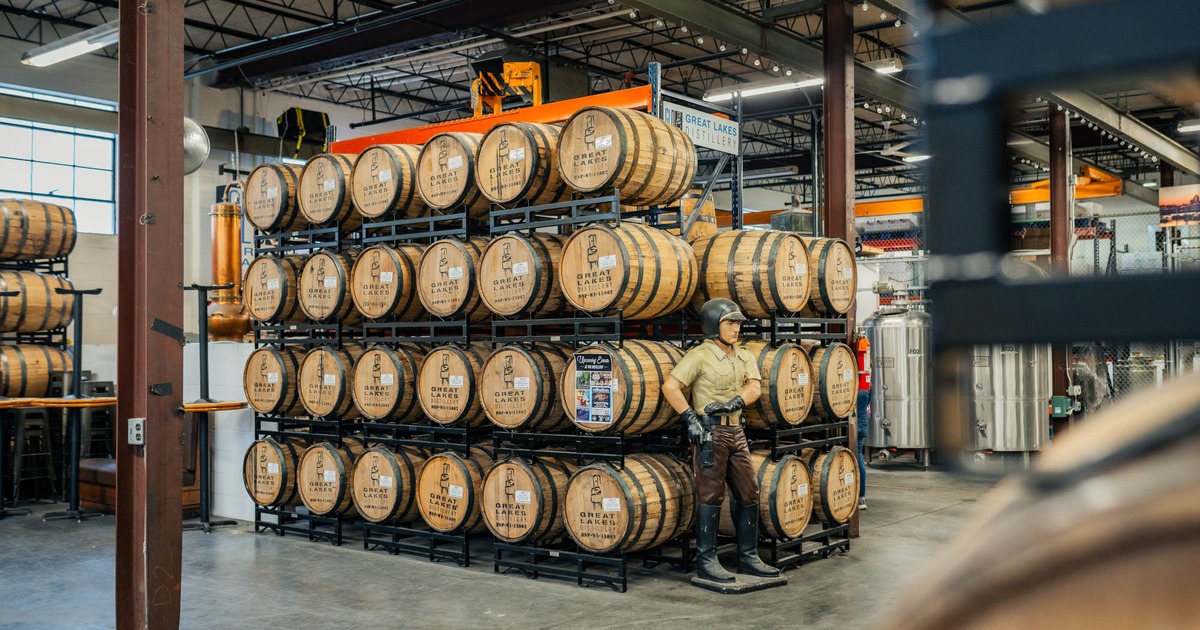 A rack with wooden barrels in a warehouse space