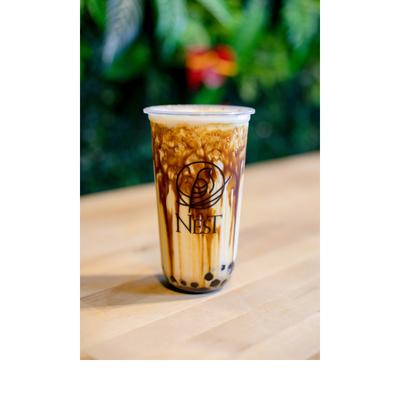 Iced milk tea with boba pearls.