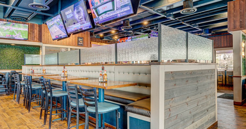 Interior, tables, chairs and high back benches