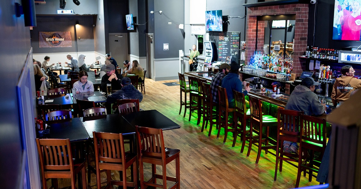 Interior space, seating area and bar area, guests enjoying their drinks