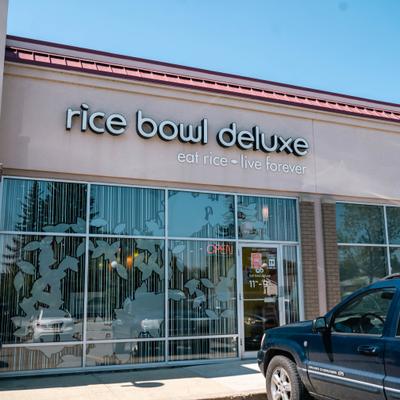 Restaurant front entrance and sign above the door.