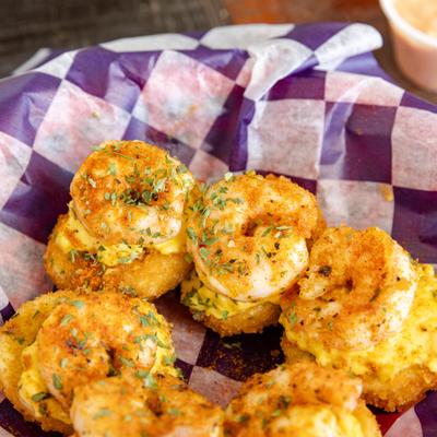 Portion of fried shrimp deviled eggs.