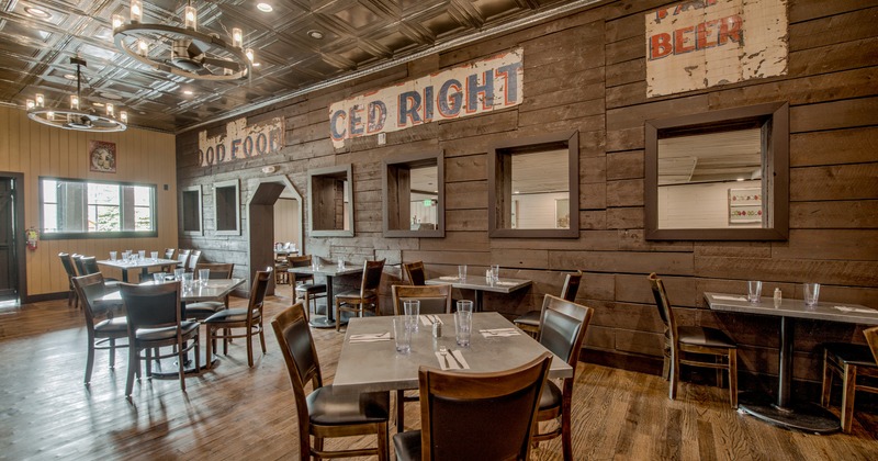 Interior, dining area with wooden panels on the walls
