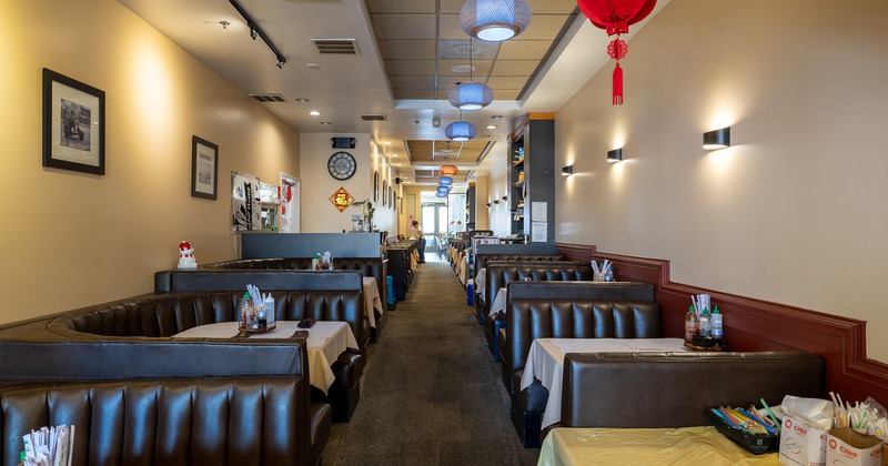Cozy interior dining area with upholstered dining booths