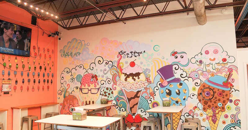 Interior, seating area, mural painting of cartooned ice cream characters