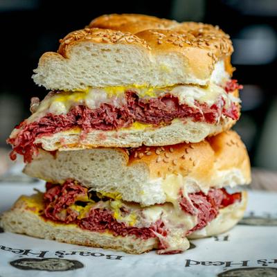 Hot pastrami with Swiss cheese Dijon mustard on braided roll.