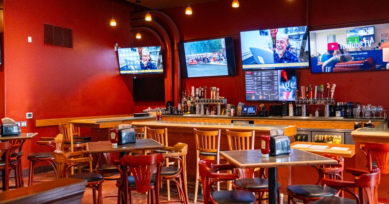 Interior, seating, TVs on the walls