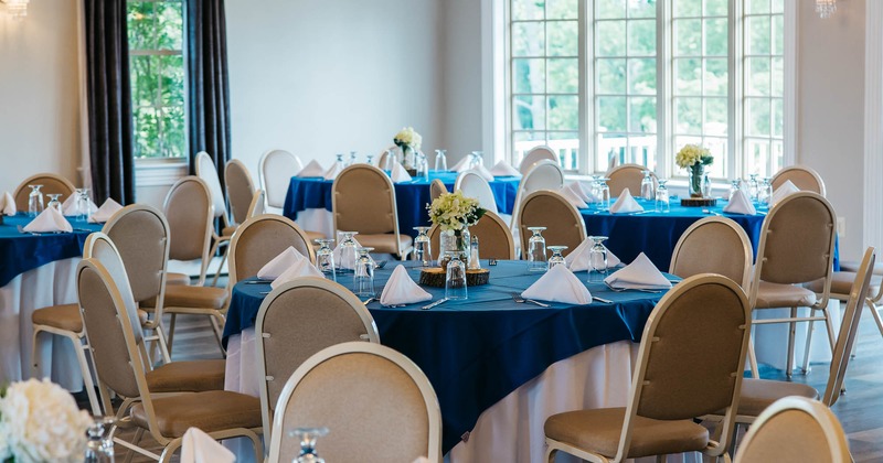 Interior, banquet room with windows in background