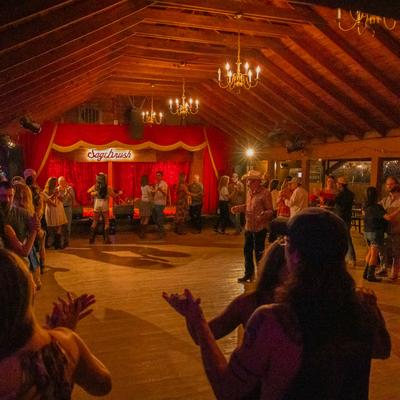 People dancing on the floor.