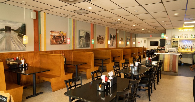 Interior, seating area, tables, chairs, and booths