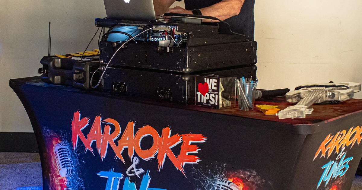 DJ operating the karaoke setup