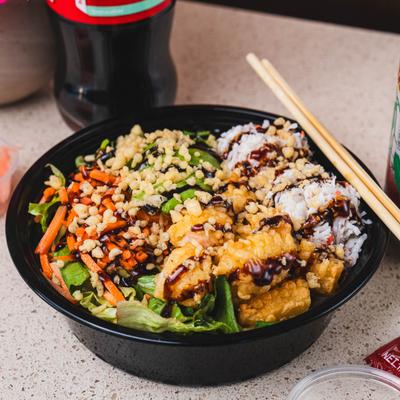 Shrimp tempura bowl, with teriyaki sauce, rice, and veggies.