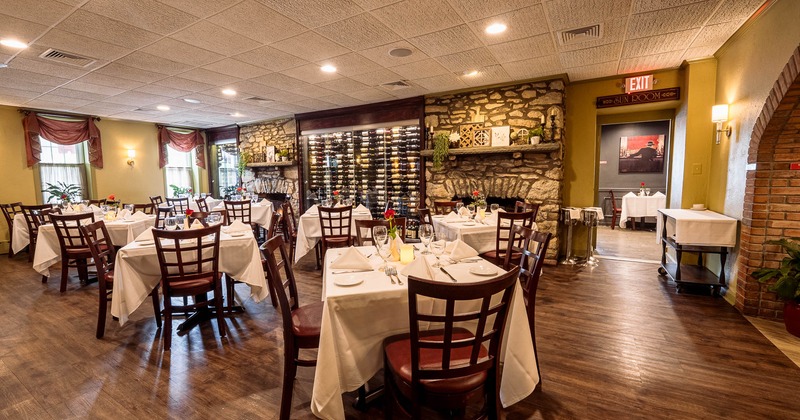Interior, tables set for guests