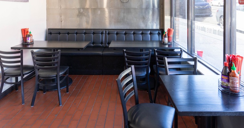 Interior, dining tables by the windows