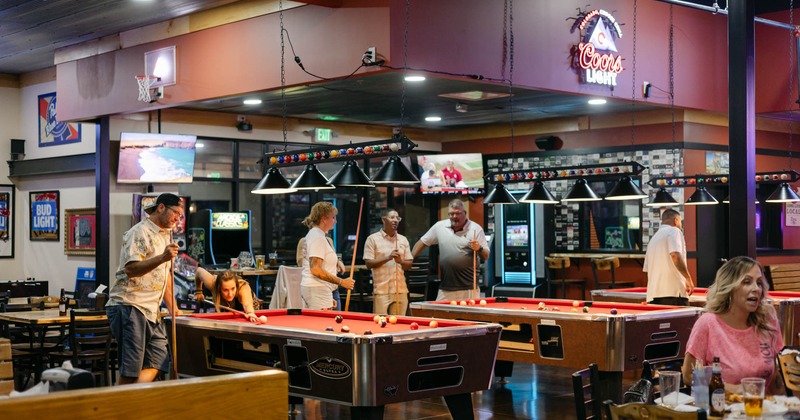 Interior, pool tables lined up