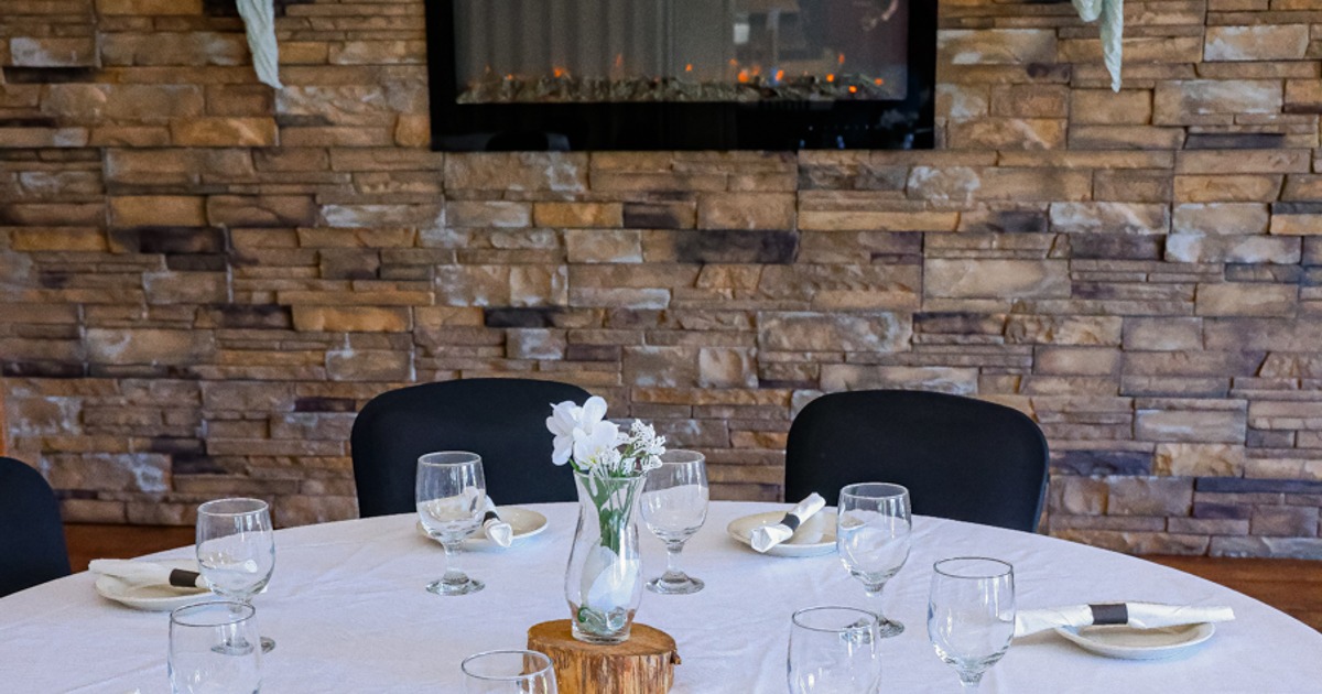 Elegantly decorated and set round table close up