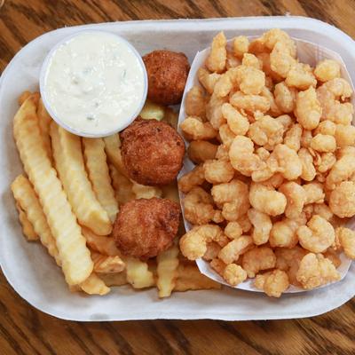 Popcorn shrimp, fires, hushpuppies, and tartar sauce.