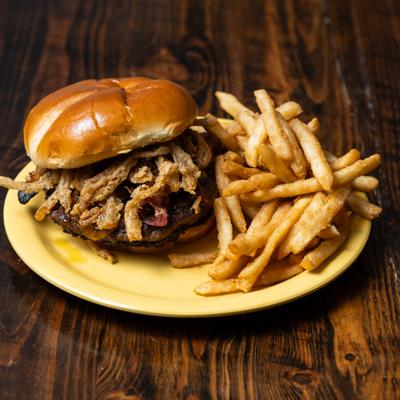 Kickin bourbon sandwich served with fries.