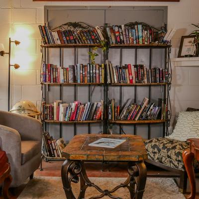 Chilout room, books on the shelf, armchairs, coffee table