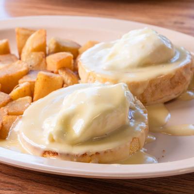 Eggs Benedict with roasted potatoes.