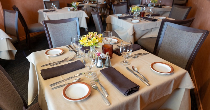 Dining table set for four guests