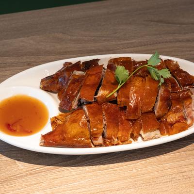 Crispy Roast Duck with dipping sauce.