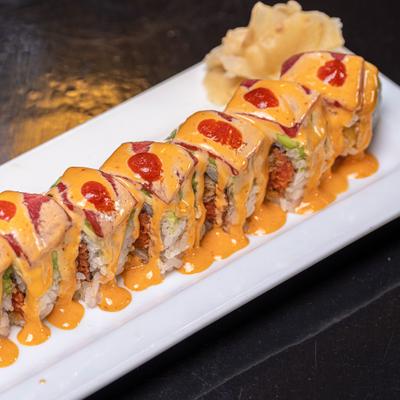 Burning Man Roll with shrimp tempura, spicy tuna and Thai chili pepper.