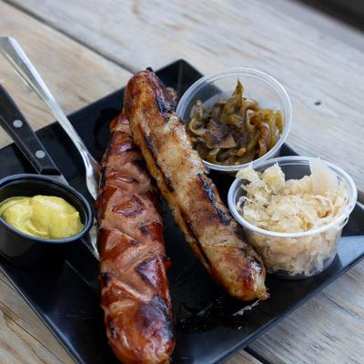 Grilled sausages, with sauerkraut, and caramelized onions.