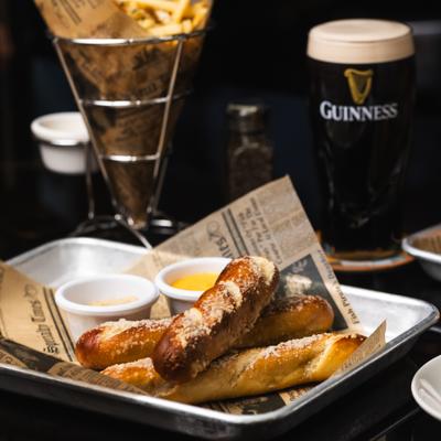 Warm Baked Pretzels, with cheese dip and pub mustard.