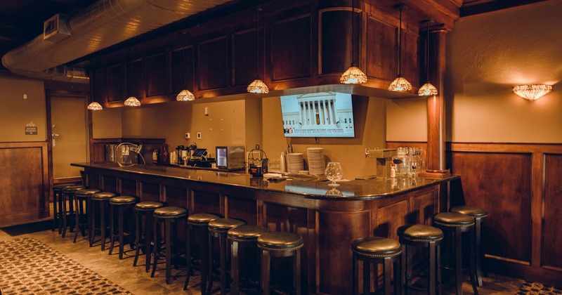 Bar and seating area with bar stools