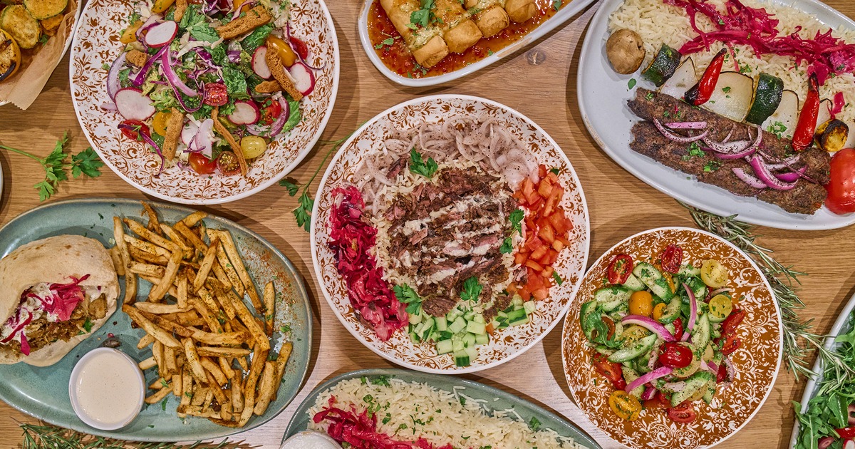 Miscellany of dishes on a table, top view