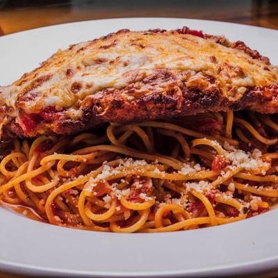 Chicken parmigiana with spaghetti.