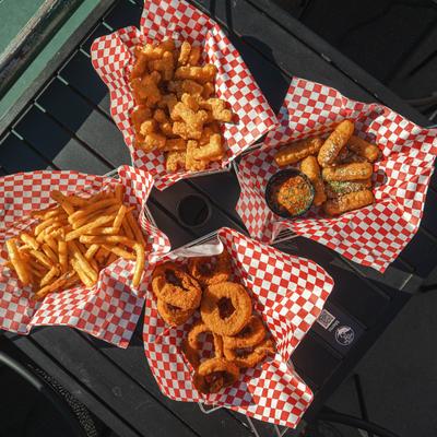 Tater tots, mozzarella sticks, onion rings, and fries.