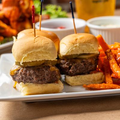 Cheeseburger sliders and sweet potato fries.